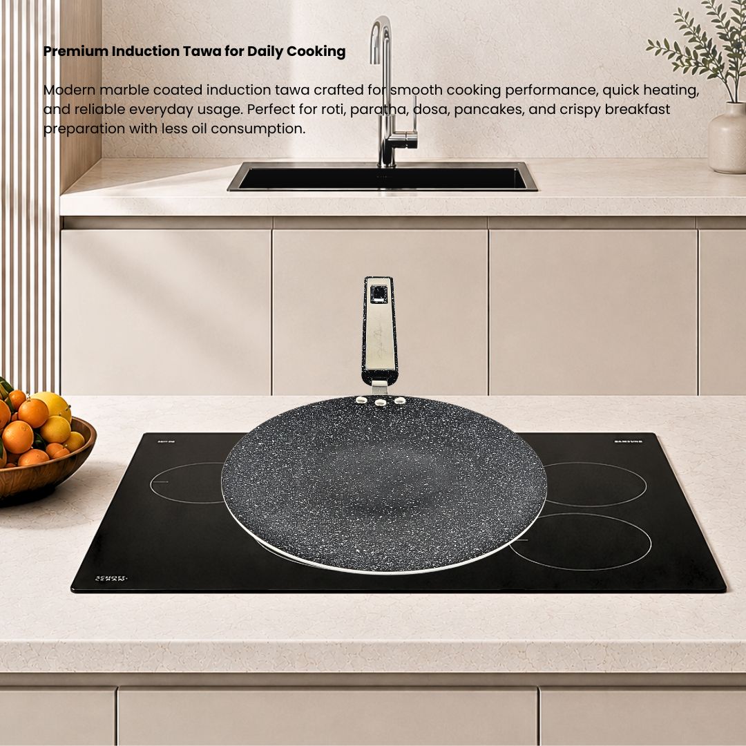 Induction marble coated nonstick tawa with heavy gauge body and heat resistant handle for daily cooking.